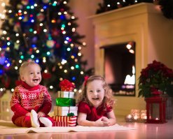 Two kids are enjoying Christmas